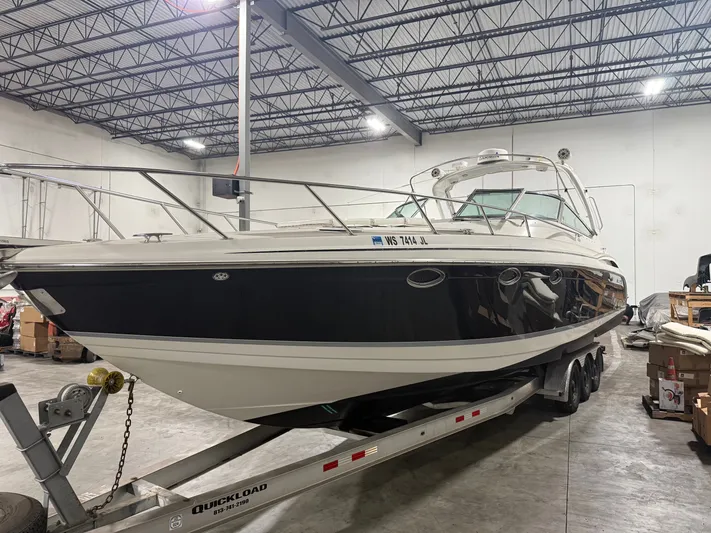 Prime Time Yacht Photos Pics 2005 Formula 370 Super Sport boat in warehouse on trailer.