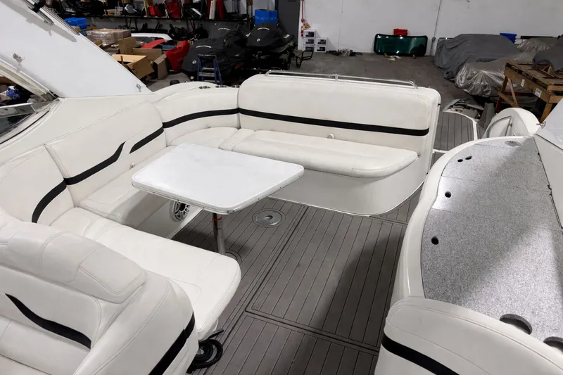 Prime Time Yacht Photos Pics Interior of a 2005 Formula 370 Super Sport boat with white seating.