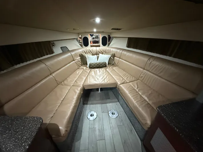 Prime Time Yacht Photos Pics Interior of 2005 Formula 370 Super Sport with leather seating area.