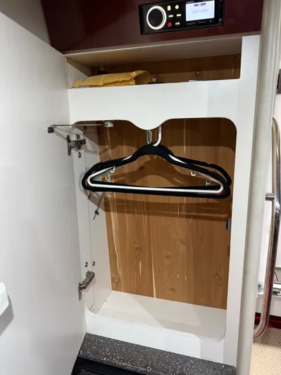 Prime Time Yacht Photos Pics Interior of a 2005 Formula 370 Super Sport with closet.