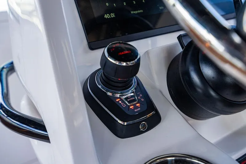  Yacht Photos Pics Joystick control on 2021 Intrepid 477 Evolution boat dashboard.