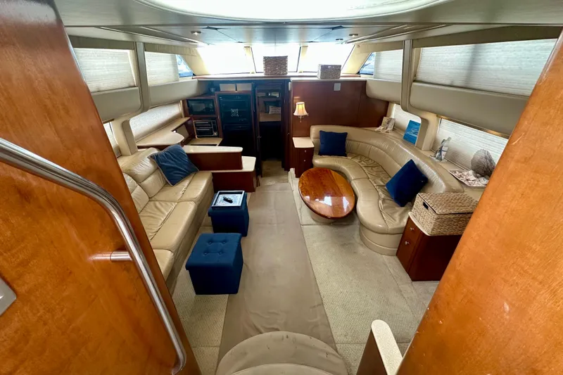  Yacht Photos Pics Luxurious interior of 2005 Meridian 459 Motoryacht with leather seating and wooden accents.