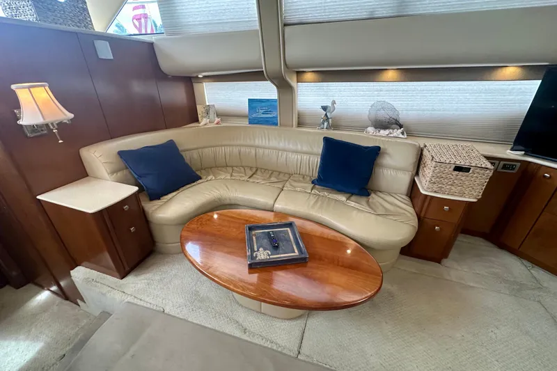  Yacht Photos Pics Luxurious interior of 2005 Meridian 459 Motoryacht with leather seating and wooden accents.
