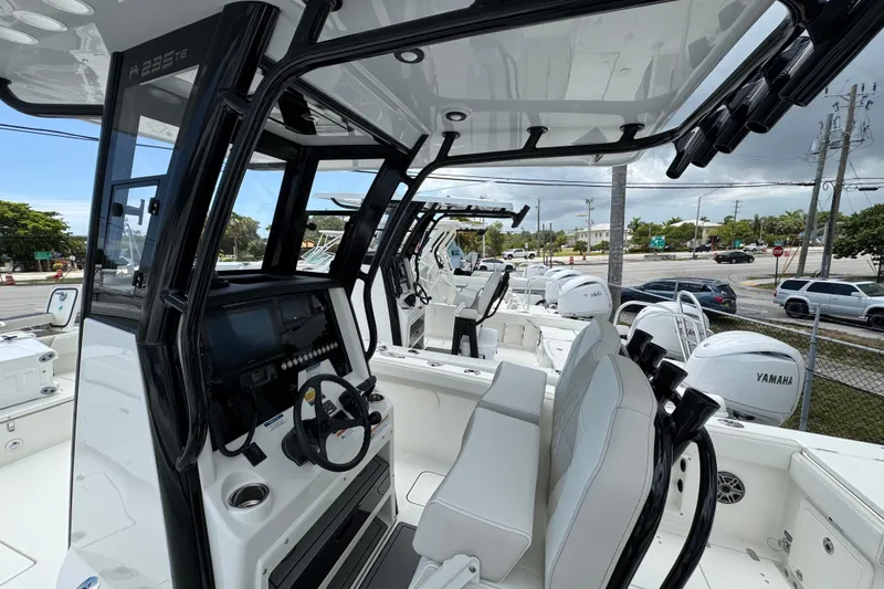 57562 235te Sf Yacht Photos Pics 2026 World Cat 235 TE boat interior with modern helm and seating, featuring Yamaha engines.