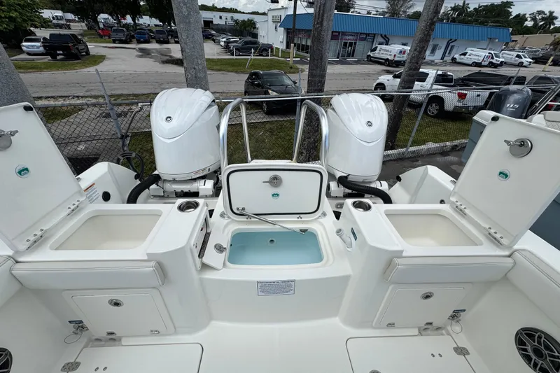 57562 235te Sf Yacht Photos Pics 2026 World Cat 235 TE boat with dual engines and open storage compartments.