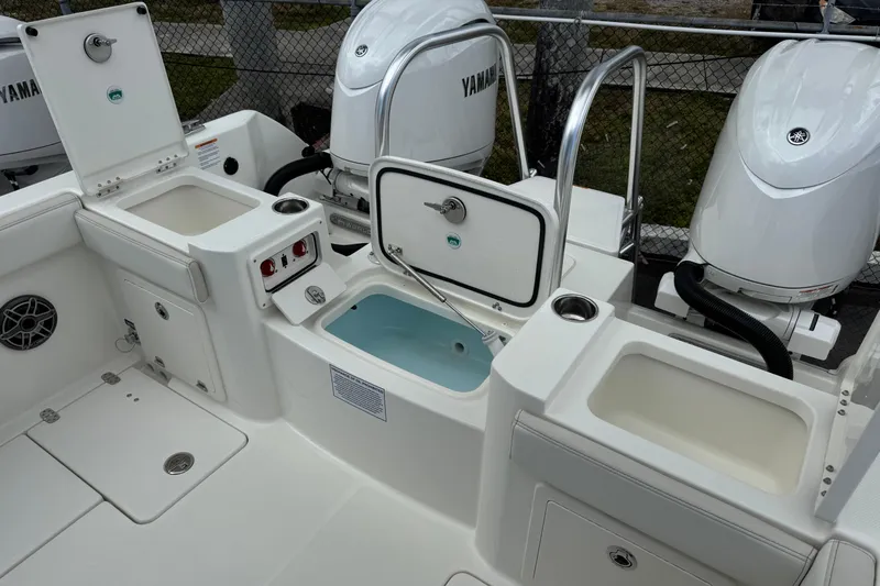57562 235te Sf Yacht Photos Pics 2026 World Cat 235 TE boat interior with Yamaha engines and storage compartments.