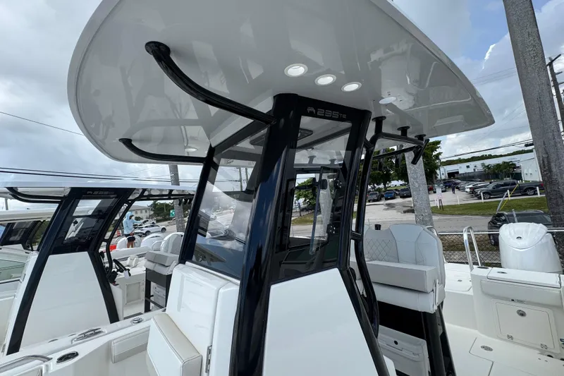 57562 235te Sf Yacht Photos Pics 2026 World Cat 235 TE boat with sleek design and modern features, docked outdoors.