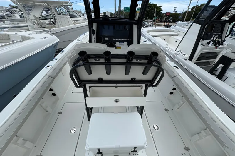 57562 235te Sf Yacht Photos Pics 2026 World Cat 235 TE boat interior with rod holders and seating.