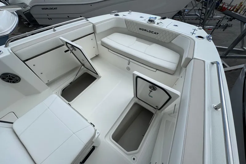 57562 235te Sf Yacht Photos Pics 2026 World Cat 235 TE boat interior with open storage compartments and seating.