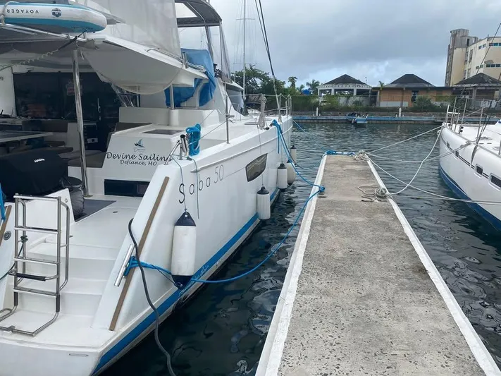  Yacht Photos Pics Fountaine Pajot SABA 50 catamaran docked at marina, 2015 model.