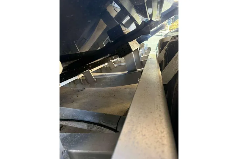  Yacht Photos Pics 2022 Contender 35 ST boat trailer close-up, showcasing structural details.