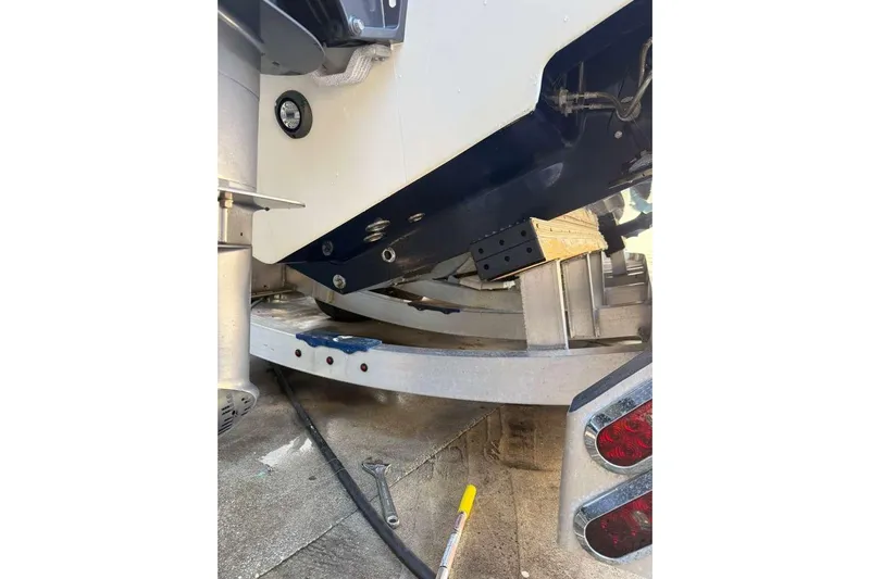  Yacht Photos Pics 2022 Contender 35 ST boat on trailer, showing rear hull and trailer details.