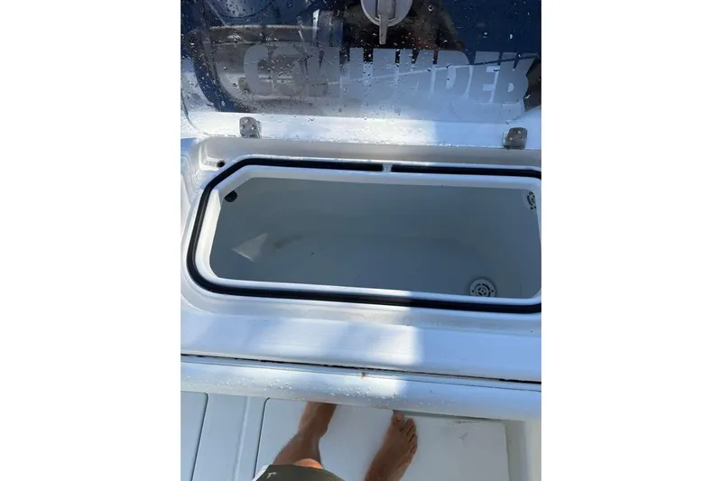  Yacht Photos Pics Open storage compartment on 2022 Contender 35 ST boat deck.