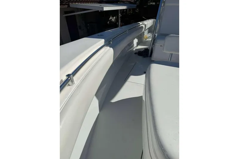  Yacht Photos Pics 2022 Contender 35 ST boat interior with white seating and sleek design.