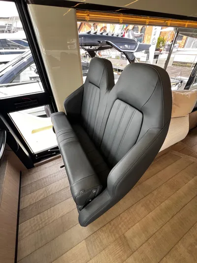  Yacht Photos Pics Luxurious seating inside 2025 Absolute NAVETTA 48 yacht, featuring sleek design and premium materials.