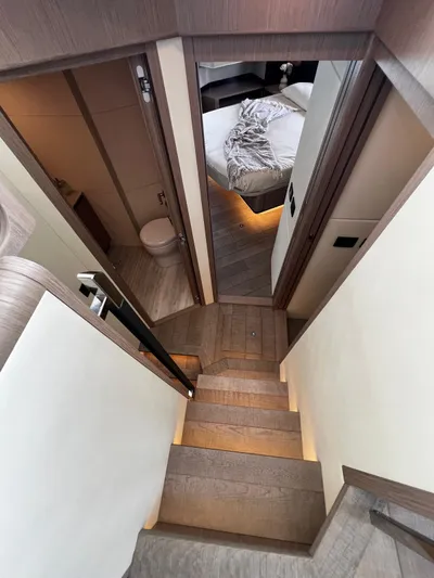  Yacht Photos Pics Staircase leading to a bedroom and bathroom in a 2025 Absolute NAVETTA 48 yacht.