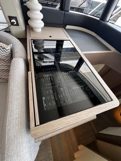  Yacht Photos Pics Interior of 2025 Absolute NAVETTA 48 yacht with modern control panel and sleek design.