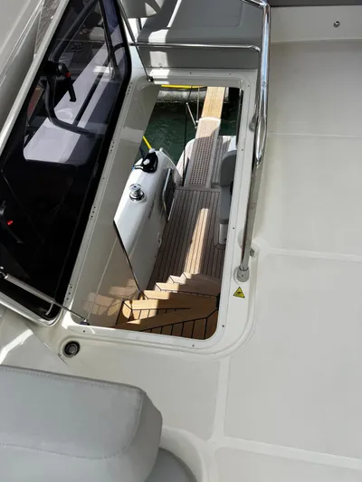  Yacht Photos Pics 2025 Absolute NAVETTA 48 yacht interior with sleek stairs and modern design.