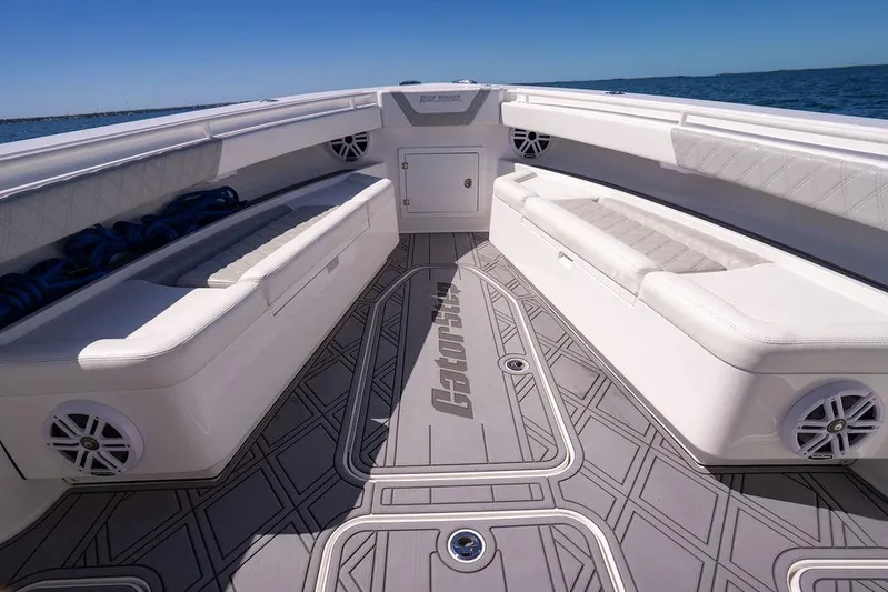 Showgirl Yacht Photos Pics 2023 Reef Runner 340 Center Console boat interior with cushioned seating and sleek design.