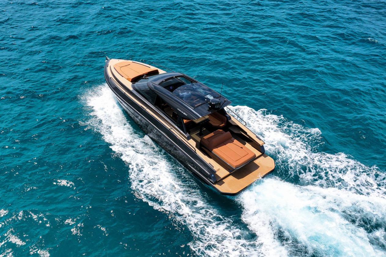 Luxurious Focus 3X yacht cruising on vibrant blue ocean, 2025 model.