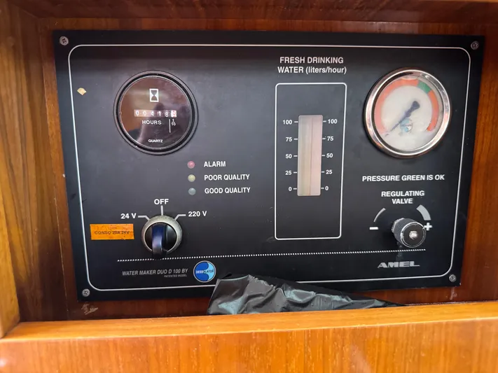Marina Yacht Photos Pics Control panel of Amel 55 water maker, 2012 model, showing water quality and pressure gauges.