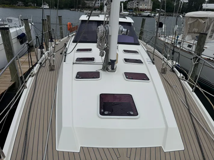 Marina Yacht Photos Pics Sailboat deck view of 2012 Amel 55, docked in a marina.