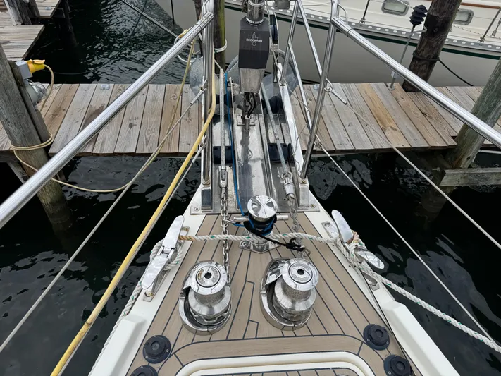 Marina Yacht Photos Pics Bow of 2012 Amel 55 yacht docked, featuring winches and deck fittings.