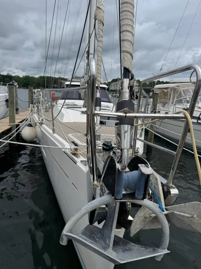 Marina Yacht Photos Pics Sailing yacht Amel 55, 2012 model, docked with visible anchor and rigging.