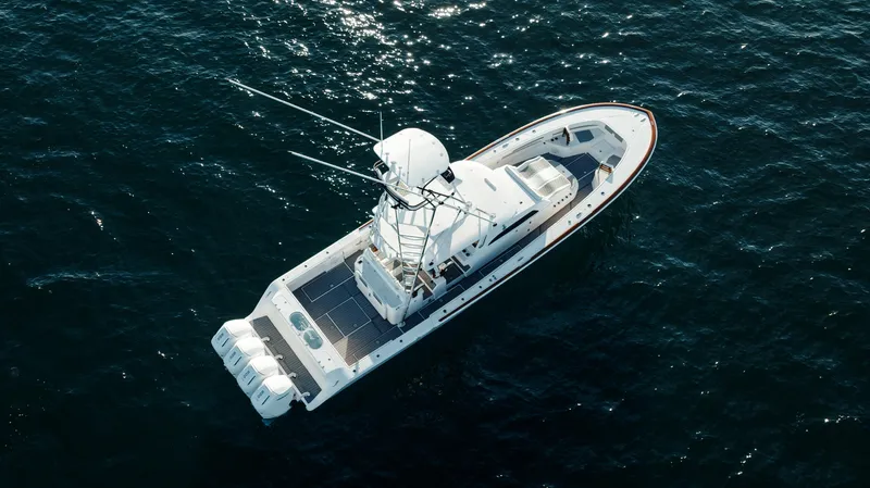  Yacht Photos Pics Aerial view of 2023 Front Runner 47 boat cruising on open water.