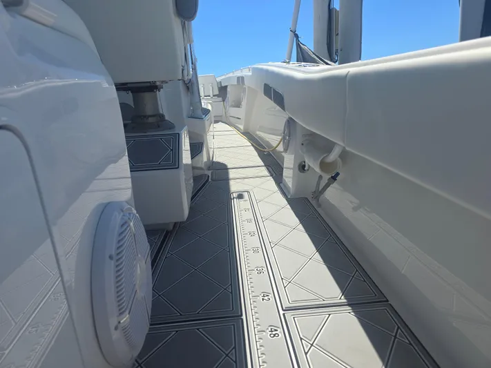  Yacht Photos Pics 2024 Invincible 43 Open Fisherman boat deck with sleek design and modern features.