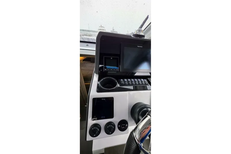  Yacht Photos Pics 2023 Sealine C335V boat dashboard with modern navigation and control systems.