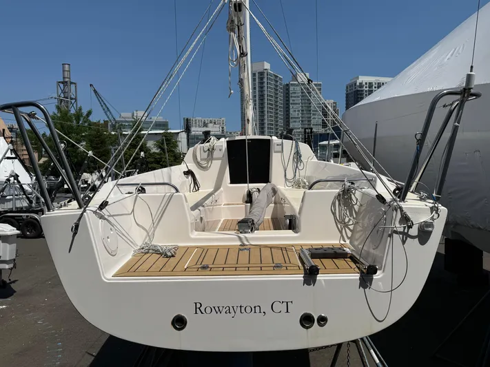 Evelyn Yacht Photos Pics 2022 J Boats J/9 sailboat docked in Rowayton, CT, with urban skyline backdrop.