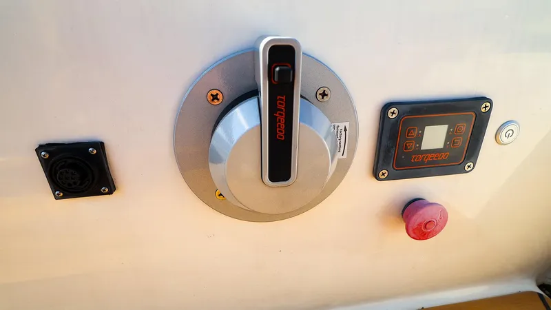 Evelyn Yacht Photos Pics Control panel of a 2022 J Boats J/9 sailboat featuring Torqeedo throttle and display.