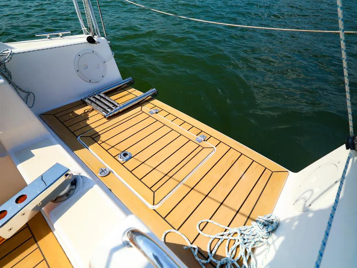 Evelyn Yacht Photos Pics 2022 J Boats J/9 sailboat deck with teak finish and stainless steel fittings.