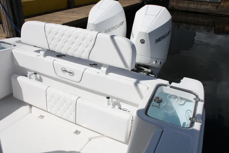  Yacht Photos Pics White Limitless 270 boat interior with dual Mercury engines, 2026 model.