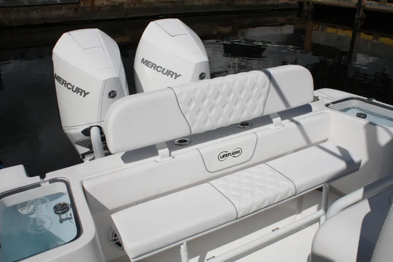  Yacht Photos Pics Limitless 270 boat with dual Mercury engines, featuring sleek white seating, 2026 model.