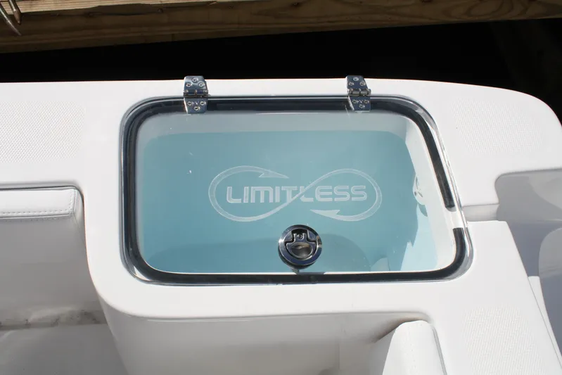  Yacht Photos Pics Limitless 270 boat livewell with logo, 2026 model, featuring sleek design and secure latch.