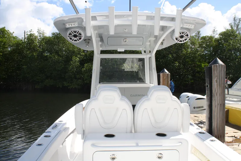  Yacht Photos Pics 2026 Limitless 270 boat interior with dual seats and advanced navigation system.
