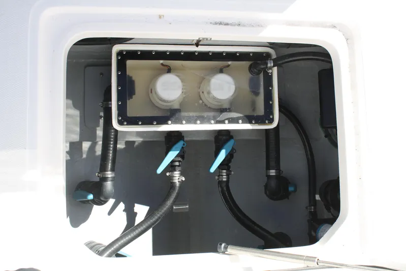  Yacht Photos Pics Compartment of Limitless 270 (2026) with plumbing and valves visible.