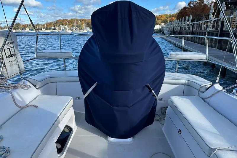  Yacht Photos Pics 2015 Catalina 315 sailboat cockpit with covered helm, docked by scenic waterfront.