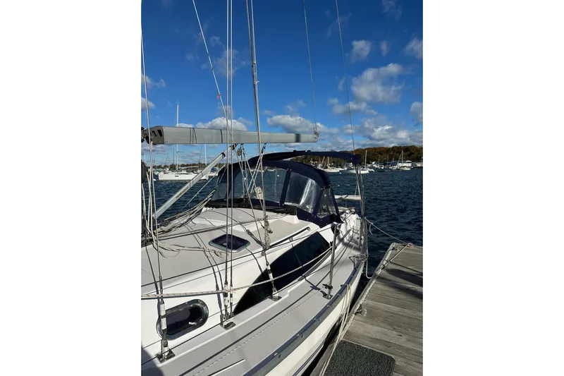 Yacht Photos Pics 2015 Catalina 315 sailboat docked at marina under clear blue sky.