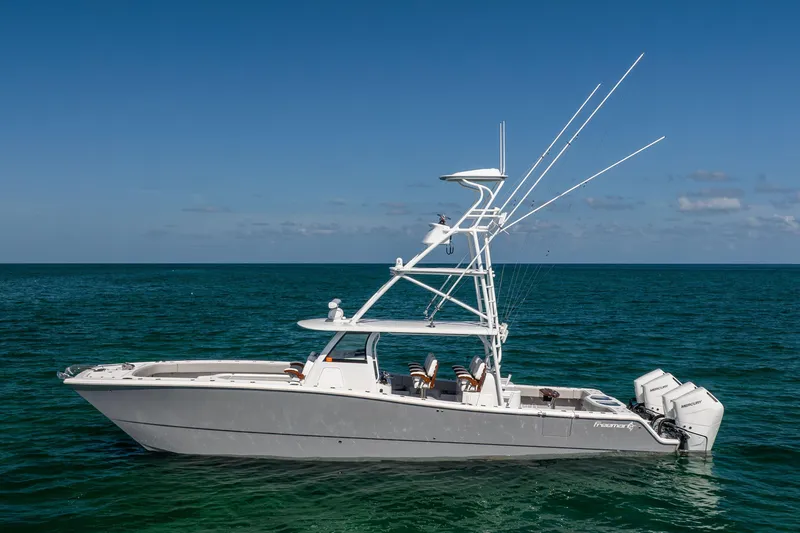  Yacht Photos Pics 2024 Freeman 43 boat on open sea under clear blue sky.