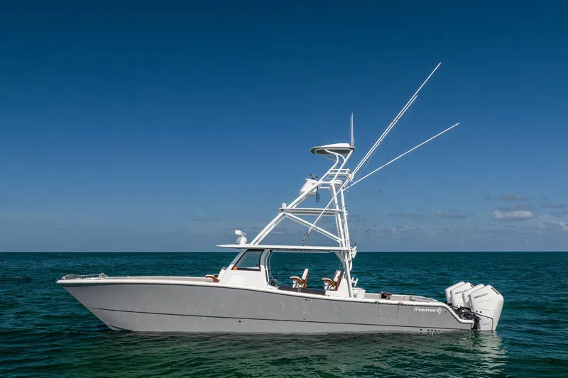  Yacht Photos Pics 2024 Freeman 43 boat on open sea under clear blue sky.