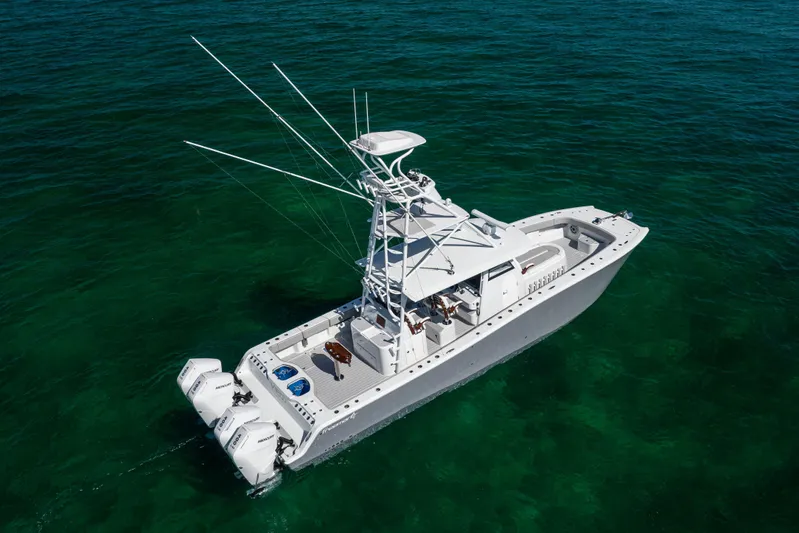  Yacht Photos Pics 2024 Freeman 43 boat on clear ocean water, aerial view.