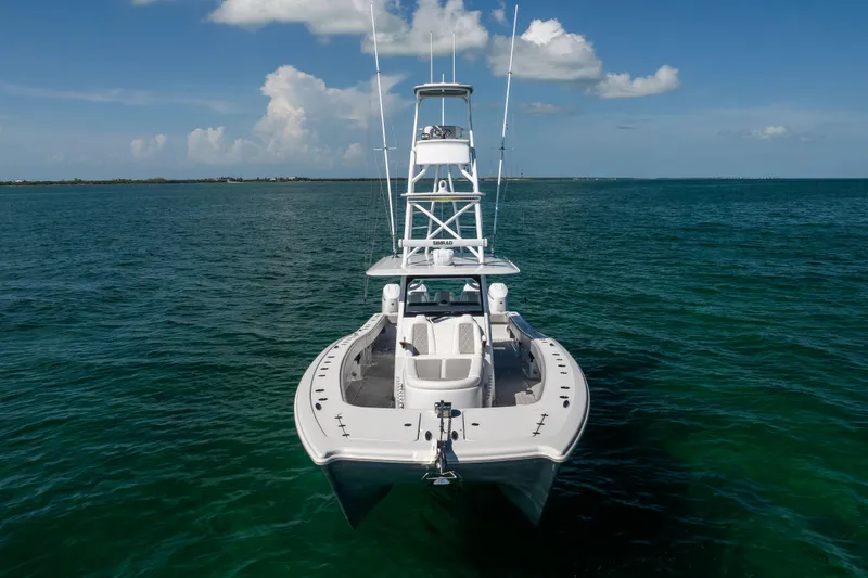  Yacht Photos Pics 2024 Freeman 43 boat on open water under blue sky.