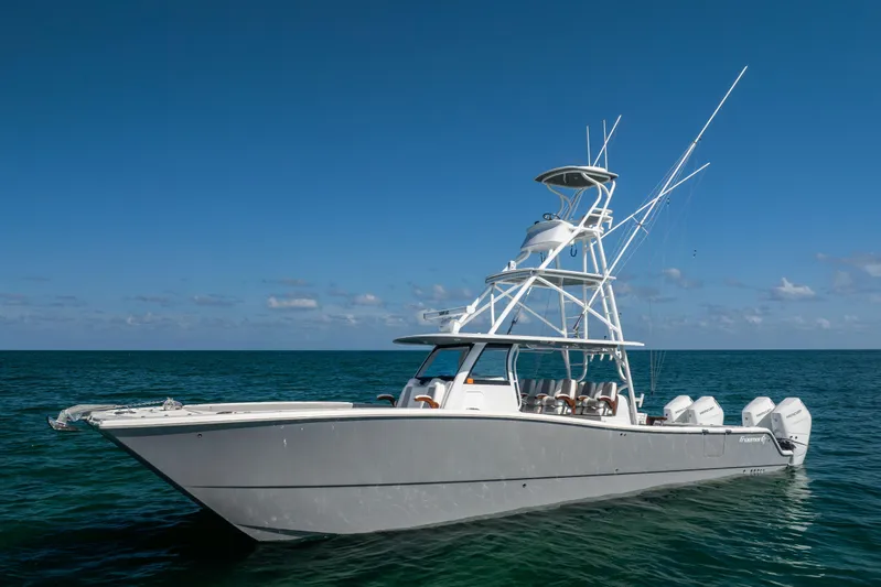 Yacht Photos Pics 2024 Freeman 43 boat on open sea under clear blue sky.