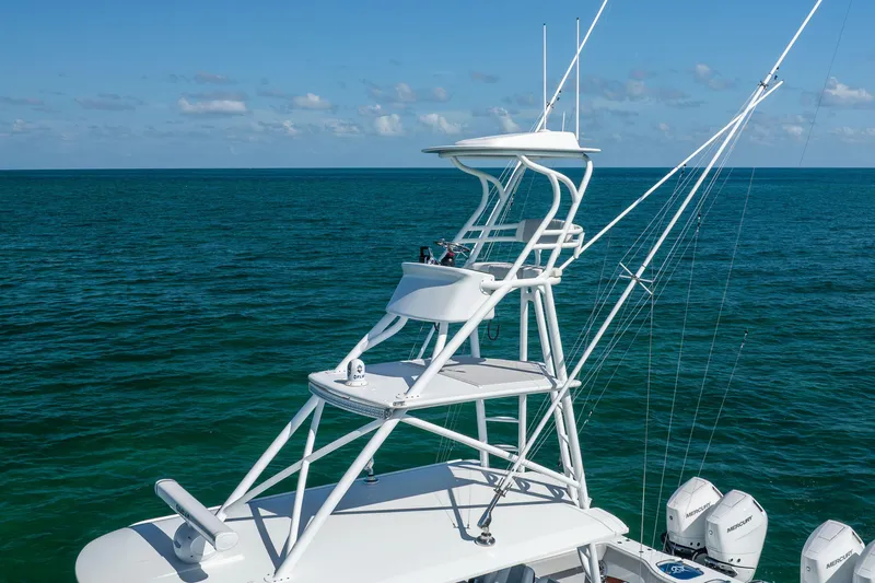  Yacht Photos Pics 2024 Freeman 43 boat with tower against ocean backdrop.