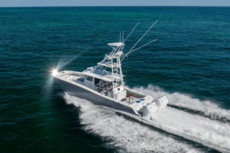  Yacht Photos Pics 2024 Freeman 43 boat cruising on open ocean waters.