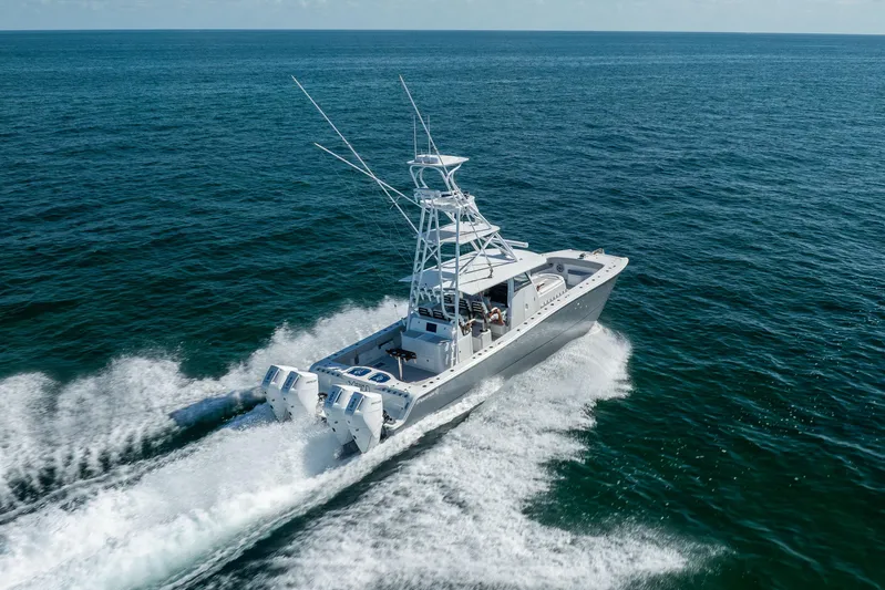  Yacht Photos Pics 2024 Freeman 43 boat cruising on open ocean waters.