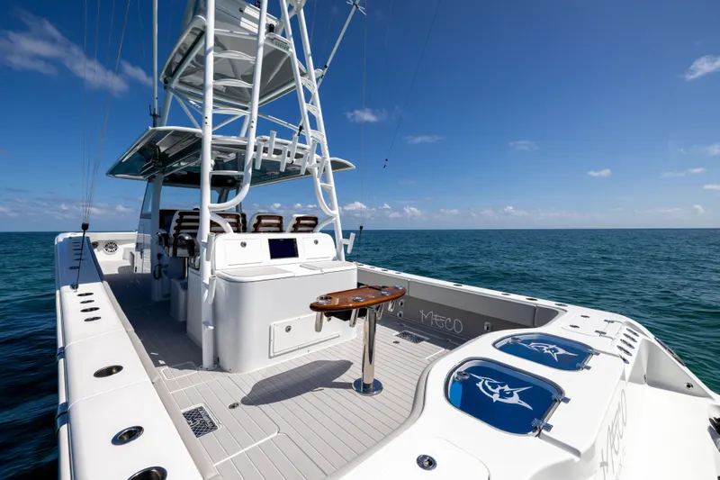  Yacht Photos Pics 2024 Freeman 43 boat on open sea, featuring spacious deck and modern design.